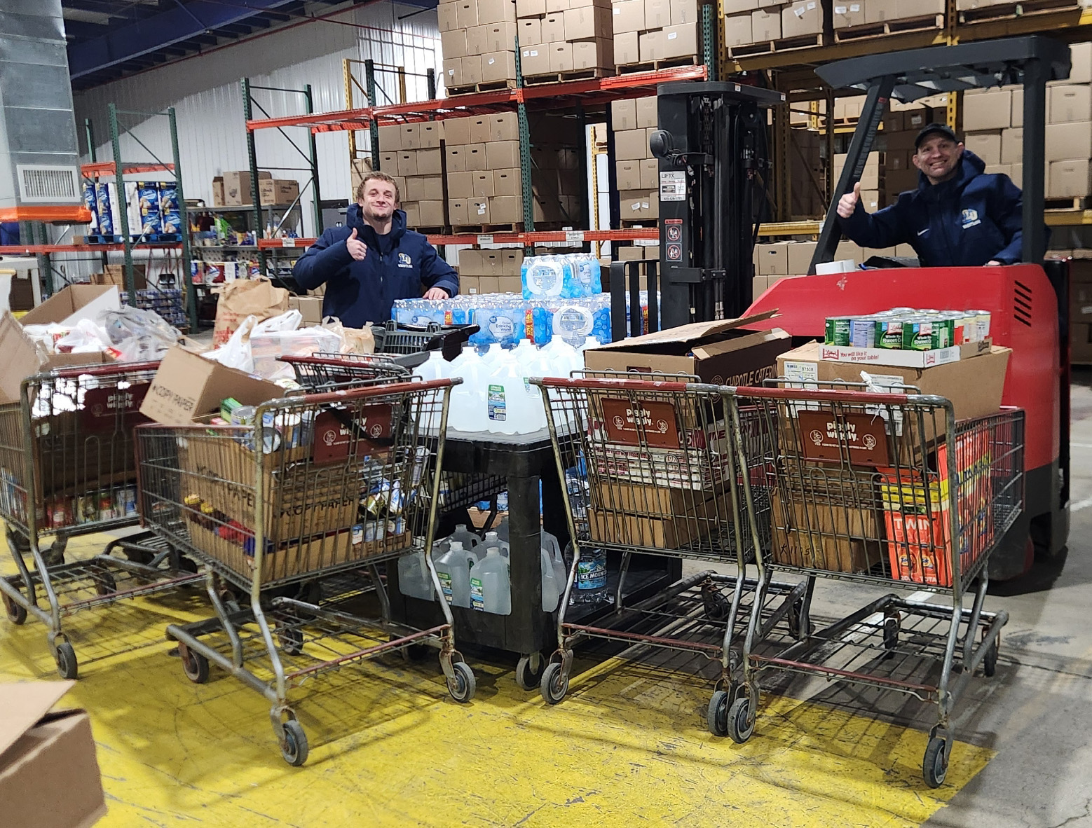 Lakeland wrestlers lead weighty food bank donation