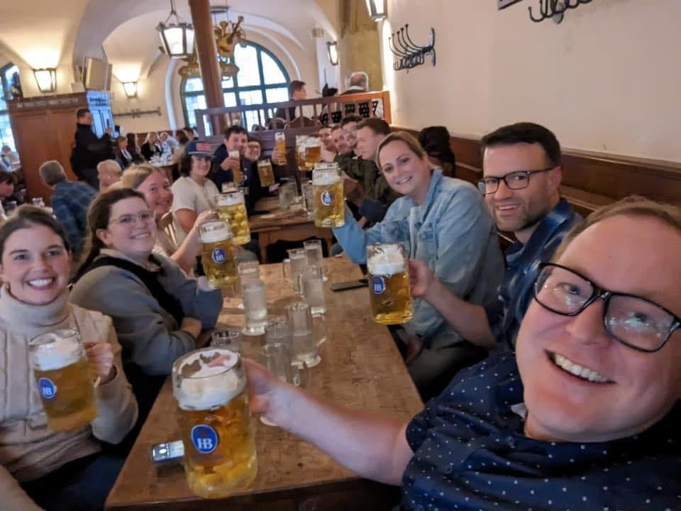 Group photo of students in a pub