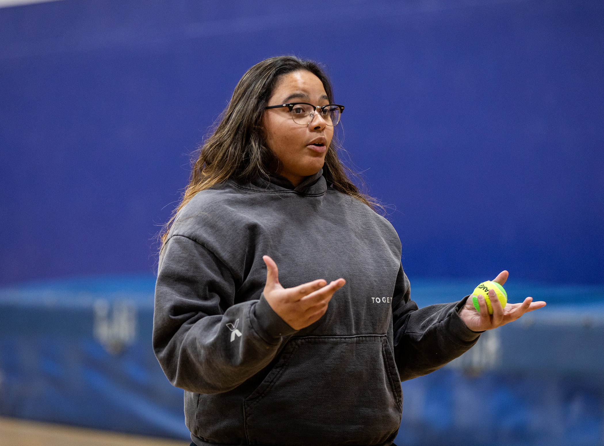 Recent grad minding her own business