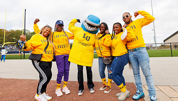 2024 homecoming photo - group posing with Musko
