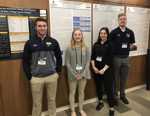 Lakeland University students presenting research.