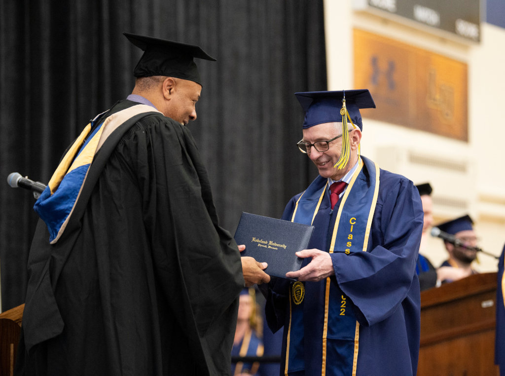 Promise kept: 65-year-old graduate delivers for his parents