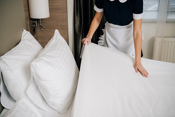 Hotel bed being folded