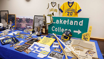 2025 homecoming photo - Lakeland memorabilia spread on table