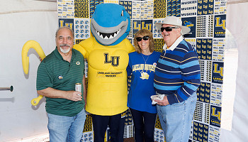 2025 homecoming photo - group posing with Musko